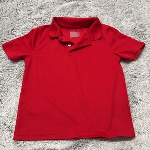 Cat & Jack performance collared T-shirt in red. Size S (6-7).